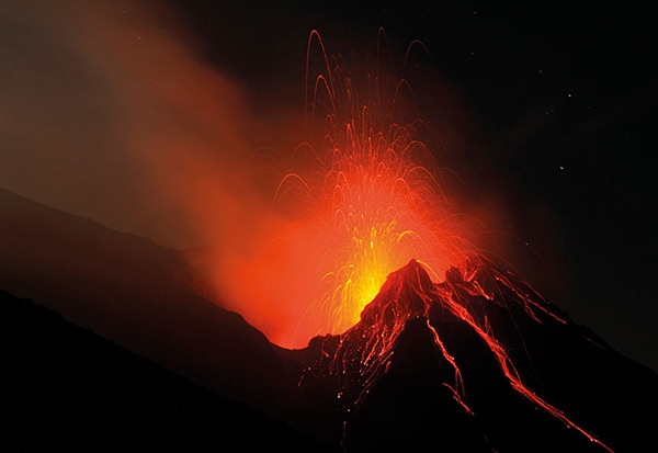 The active volcano Stromboli spews out magma at night.